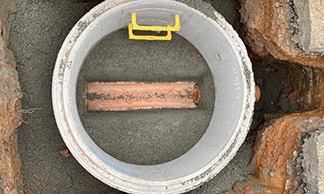 Manhole access pipe to pipework in construction